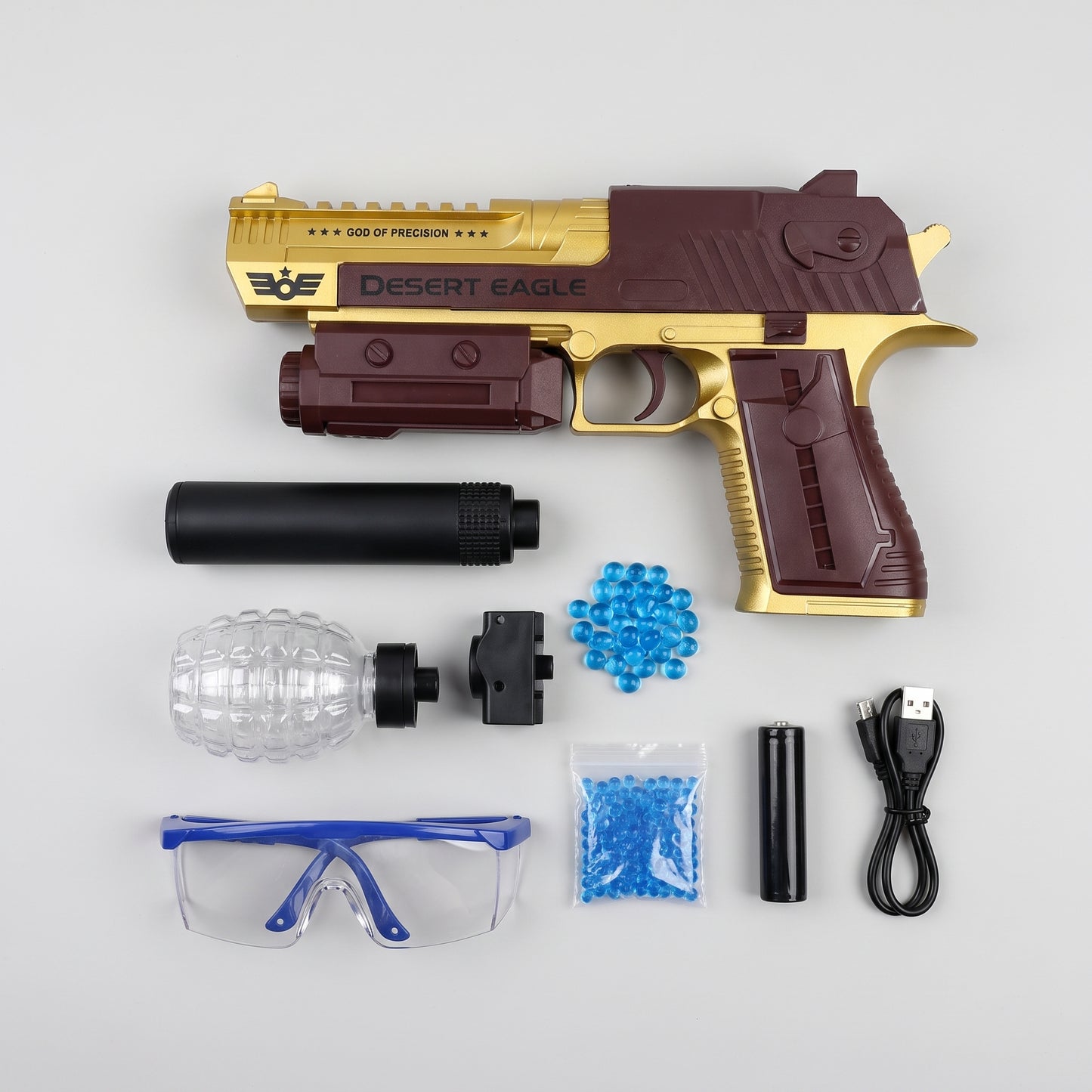 Obsah balení Gelshot Desert Eagle – pistole, tlumič, zásobník ve tvaru granátu, kuličky, baterie, USB kabel a ochranné brýle